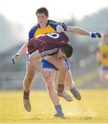 6 April 2013; Damien Comer, Galway, in action against Finbar Cregg, Roscommon. Cadbury Connacht GAA Football Under 21 Championship Final, Roscommon v Galway, Dr. Hyde Park, Roscommon. Picture credit: Stephen McCarthy / SPORTSFILE
