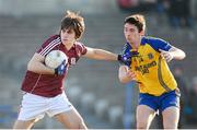6 April 2013; James Shaughnessy, Galway, in action against Colin Compton, Roscommon. Cadbury Connacht GAA Football Under 21 Championship Final, Roscommon v Galway, Dr. Hyde Park, Roscommon. Picture credit: Stephen McCarthy / SPORTSFILE