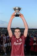 6 April 2013; Galway captain Fiontán Ó Curraoin lifts the cup following his side's victory. Cadbury Connacht GAA Football Under 21 Championship Final, Roscommon v Galway, Dr. Hyde Park, Roscommon. Picture credit: Stephen McCarthy / SPORTSFILE