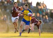 6 April 2013; Conor Daly, Roscommon, in action against Padraig Cunningham, left, and Adrian Varley, Galway. Cadbury Connacht GAA Football Under 21 Championship Final, Roscommon v Galway, Dr. Hyde Park, Roscommon. Picture credit: Stephen McCarthy / SPORTSFILE