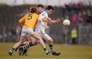 7 April 2013; Ryan Jones, Fermanagh, is tackled by Meath players Ciaran Lenihan, 5, and Brian Meade. Allianz Football League, Division 3, Meath v Fermanagh, Pairc Tailteann, Navan, Co. Meath. Picture credit: Ray McManus / SPORTSFILE