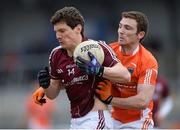 7 April 2013; Michael Meehan, Galway, in action against Brendan Donaghy, Armagh. Allianz Football League, Division 2, Armagh v Galway, Athletic Grounds, Armagh. Photo by Sportsfile