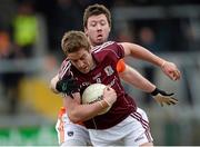 7 April 2013; Gary O'Donnell, Galway, in action against Sean Clarke, Armagh. Allianz Football League, Division 2, Armagh v Galway, Athletic Grounds, Armagh. Photo by Sportsfile