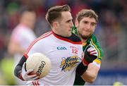 7 April 2013; Mark Donnelly, Tyrone, in action against Killian Young, Kerry. Allianz Football League, Division 1, Tyrone v Kerry, Healy Park, Omagh, Co. Tyrone. Picture credit: Stephen McCarthy / SPORTSFILE