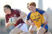 6 April 2013; Damien Comer, Galway, in action against Fintan Kelly, Roscommon. Cadbury Connacht GAA Football Under 21 Championship Final, Roscommon v Galway, Dr. Hyde Park, Roscommon. Picture credit: Stephen McCarthy / SPORTSFILE
