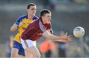6 April 2013; Damien Comer, Galway, in action against Ciaran Cafferkey, Roscommon. Cadbury Connacht GAA Football Under 21 Championship Final, Roscommon v Galway, Dr. Hyde Park, Roscommon. Picture credit: Stephen McCarthy / SPORTSFILE
