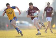 6 April 2013; Shane Walsh, Galway, in action against John McManus, Roscommon. Cadbury Connacht GAA Football Under 21 Championship Final, Roscommon v Galway, Dr. Hyde Park, Roscommon. Picture credit: Stephen McCarthy / SPORTSFILE