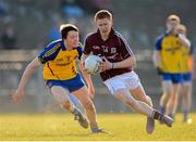 6 April 2013; Adrian Varley, Galway, in action against Ross Timothy, Roscommon. Cadbury Connacht GAA Football Under 21 Championship Final, Roscommon v Galway, Dr. Hyde Park, Roscommon. Picture credit: Stephen McCarthy / SPORTSFILE