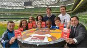 10 April 2013; In the Aviva Stadium at the Show Racism the Red Card Creative Competition Awards Exhibition are, from left, Philip McMahon, Dublin footballer, Indira Kaljo, Meteor Women’s Super League basketball, RTÉ children’s TV presenter Diana Bunici, Cliodhna O’ Connor, Dublin Ladies Football, Kevin Kilbane, former Republic of Ireland international, Eoin Reddan, Leinster and Ireland Rugby, and Jason Sherlock, former Dublin footballer, with pupils from Scoil Choilm, Clonsilla, Dublin, from left, Evelyn Turcanu, Clinton Eluka and Klevis Malaj. The Show Racism the Red Card Creative Competition involved 140 schools and youth services devising creative responses to the challenge of racism. Twenty-five schools and youth services travelled from Dublin, Cork, Limerick, Meath, Westmeath, Kildare, Leitrim and Monaghan to participate in the event, which showcased some of the work being done by young people to support the Show Racism the Red Card message. Aviva Stadium, Lansdowne Road, Dublin. Picture credit: Matt Browne / SPORTSFILE