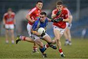 10 April 2013; Paddy Dalton, Tipperary, in action against Alan Cadogan, Cork. Cadbury Munster GAA Football Under 21 Championship Final, Tipperary v Cork, Semple Stadium, Thurles, Co. Tipperary. Picture credit: Diarmuid Greene / SPORTSFILE