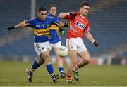 10 April 2013; Paddy Dalton, Tipperary, in action against Jamie Wall, Cork. Cadbury Munster GAA Football Under 21 Championship Final, Tipperary v Cork, Semple Stadium, Thurles, Co. Tipperary. Picture credit: Diarmuid Greene / SPORTSFILE