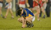 10 April 2013; Jason Lonergan, Tipperary, shows his disappointment after defeat to Cork. Cadbury Munster GAA Football Under 21 Championship Final, Tipperary v Cork, Semple Stadium, Thurles, Co. Tipperary. Picture credit: Diarmuid Greene / SPORTSFILE