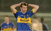 10 April 2013; Conor O'Sullivan, Tipperary, shows his disappointment after defeat to Cork. Cadbury Munster GAA Football Under 21 Championship Final, Tipperary v Cork, Semple Stadium, Thurles, Co. Tipperary. Picture credit: Diarmuid Greene / SPORTSFILE
