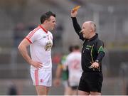 7 April 2013; Referee Marty Duffy issues a yellow card to Cathal McCarron, Tyrone. Allianz Football League, Division 1, Tyrone v Kerry, Healy Park, Omagh, Co. Tyrone. Picture credit: Stephen McCarthy / SPORTSFILE