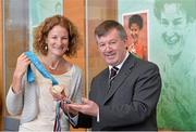 13 April 2013; Former Olympic silver medallist, World Cross Country Champion and European 5000m and 10000m Champion Sonia O'Sullivan and Dr. Michael Murphy, President of UCC, with a number of her medals which will be on display in the Pavillion at the opening of the Sonia O'Sullivan Athletics Track. Mardyke Arena, Cork. Picture credit: Brendan Moran / SPORTSFILE