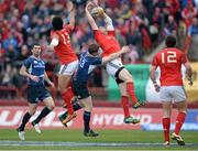 13 April 2013; Denis Hurley, Munster, gets a high ball ahead of Brian O'Driscoll, Leinster and team mate Casey Laulala. Celtic League 2012/13, Round 20, Munster v Leinster, Thomond Park, Limerick. Picture credit: Brendan Moran / SPORTSFILE