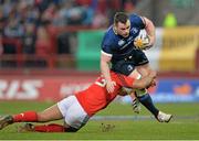 13 April 2013; Cian Healy, Leinster, is tackled by Casey Laulala, Munster. Celtic League 2012/13, Round 20, Munster v Leinster, Thomond Park, Limerick. Picture credit: Brendan Moran / SPORTSFILE