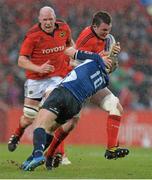 13 April 2013; Peter O'Mahony, Munster, is tackled by Ian Madigan, Leinster. Celtic League 2012/13, Round 20, Munster v Leinster, Thomond Park, Limerick. Picture credit: Diarmuid Greene / SPORTSFILE