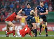 13 April 2013; Mike Ross, Leinster, with support from team mate Devin Toner, is tackled by Tommy O'Donnell, left, and Conor Murray, Munster. Celtic League 2012/13, Round 20, Munster v Leinster, Thomond Park, Limerick. Picture credit: Brendan Moran / SPORTSFILE