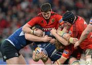 13 April 2013; Sean O'Brien, Leinster, is tackled by James Downey, Stephen Archer and Tommy O'Donnell, Munster. Celtic League 2012/13, Round 20, Munster v Leinster, Thomond Park, Limerick. Picture credit: Brendan Moran / SPORTSFILE