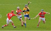 14 April 2013; Clare full back David McInerney in action against the Cork full forward line of Stephen Moylan, left, Luke O'Farrell and Patrick Horgan, right. Allianz Hurling League, Division 1A, Relegation Play-off, Clare v Cork, Gaelic Grounds, Limerick. Picture credit: Diarmuid Greene / SPORTSFILE