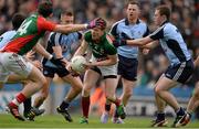 14 April 2013; Donal Vaughan, Mayo, passes to team mate Jason Doherty as he is tackled by Jack McCaffrey, Dublin. Allianz Football League, Division 1, Semi-Final, Dublin v Mayo, Croke Park, Dublin. Picture credit: Ray McManus / SPORTSFILE