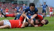 13 April 2013; Rob Kearney, Leinster, goes over the try line despite the tackle of Donncha O'Callaghan, Munster. A try was not awarded after referee Nigel Owens asked for assistance from the Television Match Official. Celtic League 2012/13, Round 20, Munster v Leinster, Thomond Park, Limerick. Picture credit: Brendan Moran / SPORTSFILE