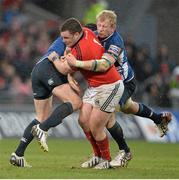 13 April 2013; Dave Kilcoyne, Munster, is tackled by Shane Jennings, left, and Leo Cullen, Leinster. Celtic League 2012/13, Round 20, Munster v Leinster, Thomond Park, Limerick. Picture credit: Brendan Moran / SPORTSFILE