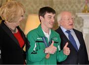 18 April 2013; Team Ireland floorball athlete Brendan O'Sullivan, from Mallow, Co. Cork, with President of Ireland Michael D. Higgins and his wife Sabina at a reception for the Special Olympics World Winter Games squad in Aras an Uachtarain, Phoenix Park, Dublin. Picture credit: Barry Cregg / SPORTSFILE