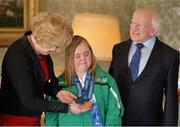 18 April 2013; Team Ireland alpine skiing athlete Lucy Best, from Lisburn, Co. Antrim, with President of Ireland Michael D. Higgins and his wife Sabina at a reception for the Special Olympics World Winter Games squad in Aras an Uachtarain, Phoenix Park, Dublin. Picture credit: Barry Cregg / SPORTSFILE