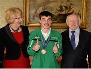 18 April 2013; Team Ireland floorball athlete Brendan O'Sullivan, from Mallow, Co. Cork, with President of Ireland Michael D. Higgins and his wife Sabina at a reception for the Special Olympics World Winter Games squad in Aras an Uachtarain, Phoenix Park, Dublin. Picture credit: Ray McManus / SPORTSFILE