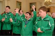 18 April 2013; Team Ireland floorball athlete Brendan O'Sullivan, second from right, Mallow, Co. Cork, and fellow athletes cheer and applaud a speech by President of Ireland Michael D. Higgins at a reception for the Special Olympics World Winter Games squad in Aras an Uachtarain, Phoenix Park, Dublin. Picture credit: Ray McManus / SPORTSFILE