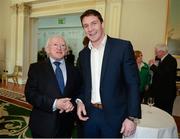 18 April 2013; SOI Board Member David Wallace with the President of Ireland Michael D. Higgins at a reception for the Special Olympics World Winter Games squad in Aras an Uachtarain, Phoenix Park, Dublin. Picture credit: Ray McManus / SPORTSFILE