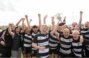 20 April 2013; Old Belvedere captain Carol Murphy lifts the Paul Flood Cup as her team-mates celebrate. Paul Flood Cup Final, Old Belvedere v Galwegians, Seapoint RFC, Killiney, Co. Dublin. Picture credit: Matt Browne / SPORTSFILE