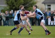20 April 2013; Sean Denvir, Galway, in action against Kevin Nolan, left, and Declan O'Mahony, Dublin. Opening of the new pitch at Round Tower GAA Club, Dublin v Galway, Round Tower GAA Club, Monastery Road, Clondalkin, Dublin. Picture credit: Barry Cregg / SPORTSFILE