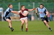 20 April 2013; Conor Doherty, Galway, in action against Kevin McManamon, left, and Chris Guckian, Dublin. Opening of the new pitch at Round Tower GAA Club, Dublin v Galway, Round Tower GAA club, Monastery Road, Clondalkin, Dublin. Picture credit: Barry Cregg / SPORTSFILE