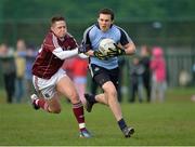 20 April 2013; Chris Guckian, Dublin, in action against Mark Hehir, Galway. Opening of the new pitch at Round Tower GAA Club, Dublin v Galway, Round Tower GAA club, Monastery Road, Clondalkin, Dublin. Picture credit: Barry Cregg / SPORTSFILE