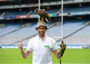 22 April 2013; Tyrone footballer Joe McMahon is joined by Tom, the Harris Hawk, to announce Specsavers' sponsorship of the new Hawkeye point detection technology for both hurling and football at Croke Park. The new system, which will be first utilised on 1st June at the Leinster GAA Football Senior Championship quarter-final double header, provides real time imagery on the stadium's big screen of a ball's trajectory over the posts to remove any ambiguity over whether a point was scored or missed. Specsavers sponsorship will now mean that any tricky point decision can be made quickly avoiding any 'Should've gone to Specsavers' moments for match officials. Croke Park, Dublin. Photo by Sportsfile
