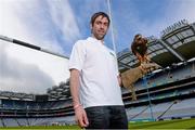 22 April 2013; Tyrone footballer Joe McMahon is joined by Tom, the Harris Hawk, to announce Specsavers' sponsorship of the new Hawkeye point detection technology for both hurling and football at Croke Park. The new system, which will be first utilised on 1st June at the Leinster GAA Football Senior Championship quarter-final double header, provides real time imagery on the stadium's big screen of a ball's trajectory over the posts to remove any ambiguity over whether a point was scored or missed. Specsavers sponsorship will now mean that any tricky point decision can be made quickly avoiding any 'Should've gone to Specsavers' moments for match officials. Croke Park, Dublin. Picture credit: Paul Mohan / SPORTSFILE