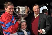 23 April 2013; Jockey Barry Geraghty, with his daughter Siofra, lifts the trophy with trainer Nicky Henderson after winning the Boylesports.com Champion Steeplechase on Sprinter Sacre. Punchestown Racecourse, Punchestown, Co. Kildare. Picture credit: Barry Cregg / SPORTSFILE