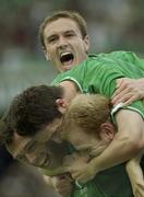 11 June 2003; Gary Doherty, Republic of Ireland, is congratulated by team-mates Robbie Keane, Gary Breen and Colin Healy, top, after scoring his sides opening goal. 2004 European Championship Qualifier, Republic of Ireland v Georgia, Lansdowne Road, Dublin. Soccer. Picture credit; Pat Murphy / SPORTSFILE *EDI*