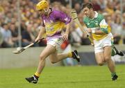 8 June 2003; Michael Jordan, Wexford, in action against Offaly's Colm Cassidy. Guinness Leinster Senior Hurling Championship, Offaly v Wexford, Nowlan Park, Kilkenny. Picture credit; Damien Eagers / SPORTSFILE *EDI*