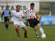 12 June 2003; Padraig Moran of Derry City in action against Tony McCarthy of Shelbourne during the Eircom League Premier Division match between Derry City and Shelbourne at the Brandywell Stadium in Derry. Photo by Matt Browne/Sportsfile