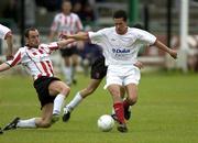 12 June 2003; Ger McCarthy of Shelbourne in action against Paddy McLoughlin of Derry City during the Eircom League Premier Division match between Derry City and Shelbourne at the Brandywell Stadium in Derry. Photo by Matt Browne/Sportsfile