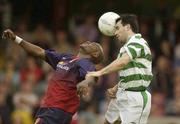 13 June 2003; Jason Colwell of Shamrock Rovers in action against Charles Mbabazi Livingstone of St Patrick's Athletic during the Eircom League Premier Division match between Shamrock Rovers and St Patrick's Athletic at Richmond Park in Dublin. Photo by David Maher/Sportsfile