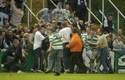 13 June 2003; Shamrock Rovers supporters and players celebrates after their side's first goal, scored by Tony Grant, during the Eircom League Premier Division match between Shamrock Rovers and St Patrick's Athletic at Richmond Park in Dublin. Photo by David Maher/Sportsfile