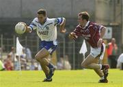 14 June 2003; Paul Finlay, Monaghan, in action against Westmeath's Paddy Rouse. Bank of Ireland Senior Football Championship qualifier, Monaghan v Westmeath, St. Tighernach's Park, Clones, Co. Monaghan. Picture credit; David Maher / SPORTSFILE *EDI*