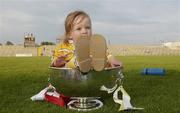 14 June 2003; 18 Month old Antrim supporter Nuala McNally sits in the cup after the Guinness Ulster Senior Hurling Championship Final between Antrim and Derry at Casement Park in Belfast. Photo by Damien Eagers/Sportsfile