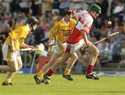 14 June 2003; Ruari Convery of Derry breaks through the Antrim defence during the Guinness Ulster Senior Hurling Championship Final between Antrim and Derry at Casement Park in Belfast. Photo by Damien Eagers/Sportsfile