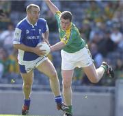 15 June 2003; Colm Miller of Laois in action against Nicky Honan of Meath during Leinster Junior Football Championship Semi-Final match between Meath and Laois at Croke Park in Dublin. Photo by Ray McManus/Sportsfile